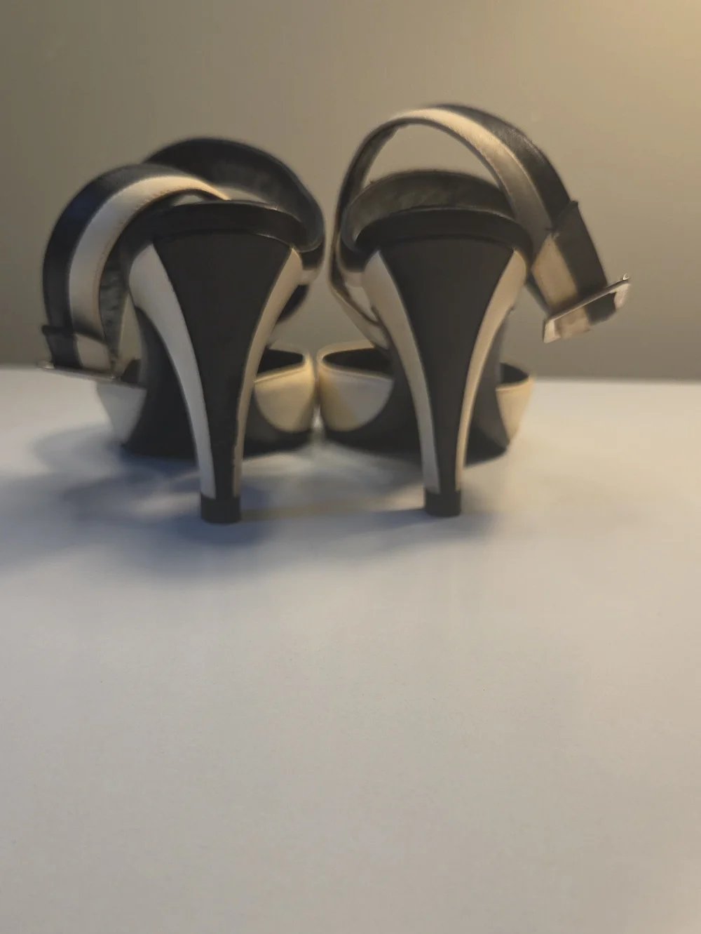 Chanel sling-back pumps feature a sophisticated pointed toe READ 35